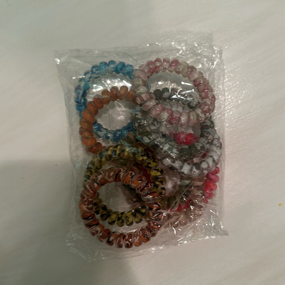 Brand new camo patterned spiral hair ties